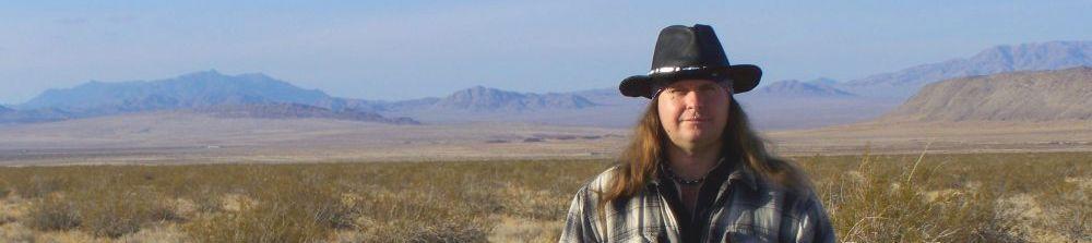 Jim Harvey in front of Rodman and Od mountains